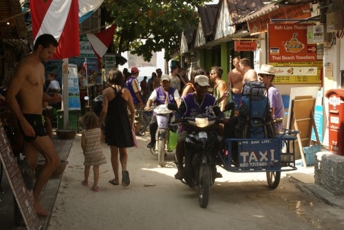The hustle and bustle of morning arrivals and departures on Walking Street.